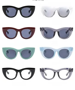 Collection of cat eye sunglasses in multiple colors like pink and mint green shown in grid