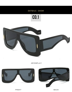 Front and back detail views of futuristic black shield sunglasses with side metal accents