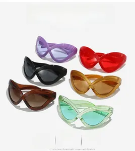 Macro detail of infinity shaped sunglasses with spiral texture in multiple fashion colors
