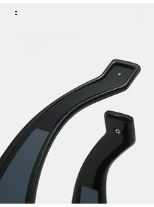 Detail of ergonomic curved mirror legs on sleek black square futuristic sunglasses