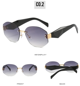 Detail view of rimless polygon sunglasses with purple gradient lenses and black temples