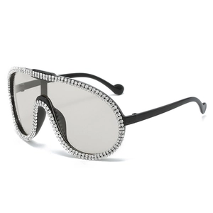 Luxury oversized rhinestone aviator sunglasses with sparkling crystal studded black frames