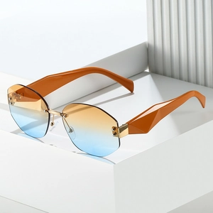 Fashion rimless sunglasses with orange-blue gradient lenses and geometric thick temples