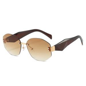 Fashionable rimless polygon sunglasses with brown gradient lenses and gold metal bridge