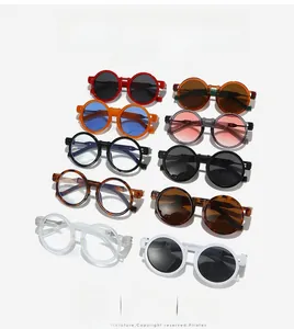 Collection of retro round frame sunglasses in multiple vibrant colors on white background