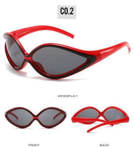 Cat eye sports sunglasses with red and black two-tone frame and dark lenses