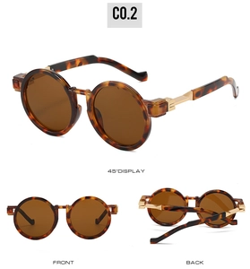 Retro round tortoise shell sunglasses with dark brown lenses and gold metal hinges