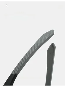 Detail of square sports sunglasses showing ergonomic curved temple with non-slip rubber grip