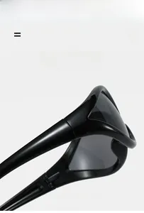Close-up of flexible hinge and sleek glossy side temple on black futuristic sunglasses