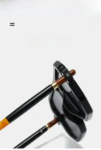 Close-up of flexible hinges and gold metal detail on dual-beam square sunglasses