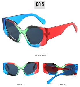Three-view display of cat eye sunglasses with rainbow gradient frames and dark grey lenses