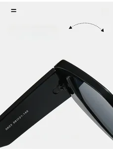 Detail of reinforced metal hinges on black cat-eye sunglasses for enhanced durability