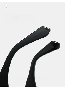 Detail view of the sleek black curved temples on cat eye sunglasses for a comfortable fit
