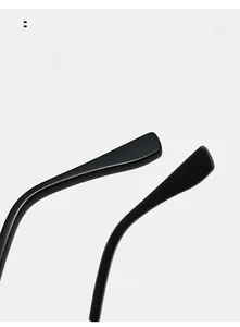 Close-up of curved matte black temples on cat-eye glasses for comfortable fit