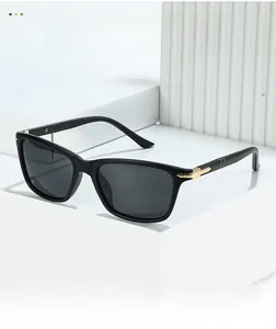 Detail of black square polarized sunglasses with decorative gold arrow accents on temples