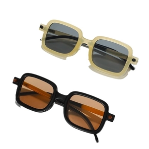 Retro square frame sunglasses in beige and black displayed on a clean white background