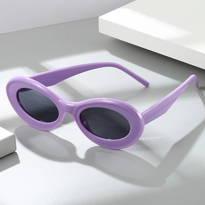 Fashionable oval lavender purple cat-eye sunglasses with dark gray lenses in retro style