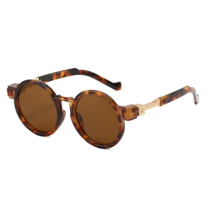 Retro oversized round sunglasses with tortoiseshell frame and dark brown lenses