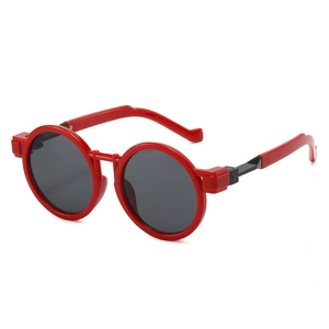 Retro round oversized red frame sunglasses with dark lenses shown from a 45-degree angle