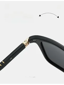 Macro detail of durable golden metal hinge on matte black polarized sunglasses frame