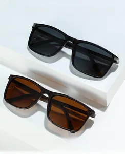 Détail des lunettes de soleil polarisées carrées avec des accents métalliques argentés