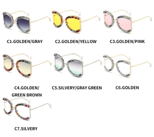 Detail showing oversized square metal sunglasses with rhinestone edges and pearl temple tips