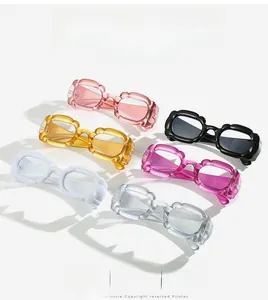 Flat lay of colorful oversized square puff sunglasses in diverse vibrant resin finishes