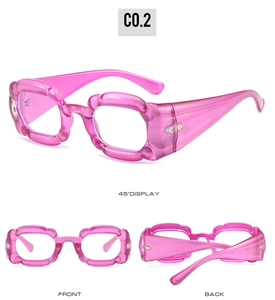 Multiple views of rose pink translucent chunky wavy square puff glasses frame