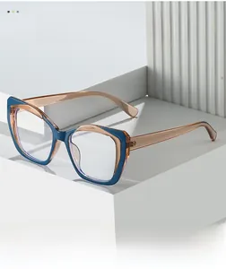 Detailed view of cat-eye TR90 glasses frames with blue and brown contrast colors