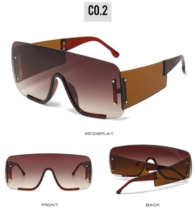 Three views of oversized semi-rimless sunglasses with gradient lenses and metal rivets