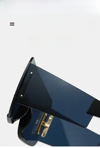 Detail view of large blue lens sunglasses with flexible frames and gold metal hinges