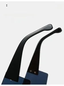 Detail of curved ergonomic temple tips and metal hinge on oversized sunglasses