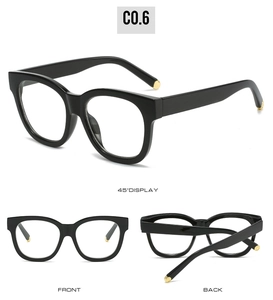 Multi-angle view of oval black frame sunglasses with gold metallic circular accents