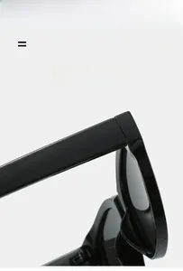 Close-up of glossy black oval sunglasses frame showing hinges and texture material