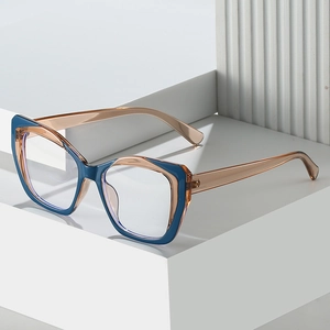 Cat-eye TR90 frames in navy blue and amber with anti-blue light clear lenses for women