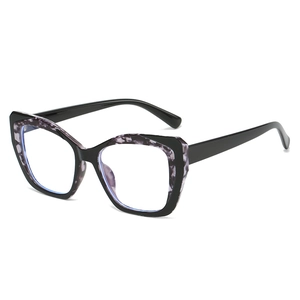 Modern cat-eye TR90 eyeglasses with black and marble textured frames for women