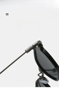 Detail showing the lightweight metal hinge and super elastic temple of black sunglasses
