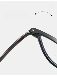 Macro detail of a durable textured metal hinge on square black eyewear frames