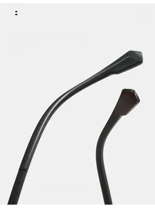 Macro detail of curved black mirror legs on minimalist square frames for comfort