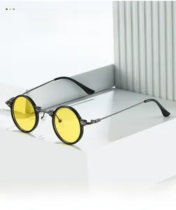 Detailansicht der gelben runden Steampunk-Sonnenbrille mit schwarzem Metallrahmen
