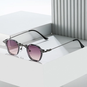 Grey transparent punk sunglasses with purple gradient lenses on minimalist white cubes