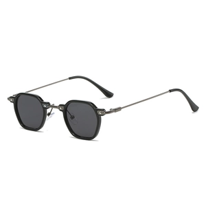 Punk geometric sunglasses with black hexagonal frame and slim metal temples on white back