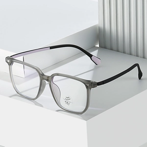Retro square anti-blue light glasses with transparent grey frame and UV400 lenses