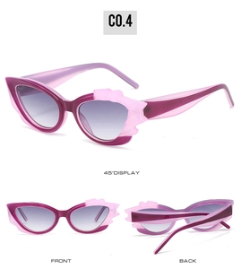 Three-view display of cat-eye sunglasses with purple gradient frames and flame-like details