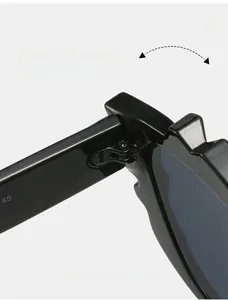 Detail of durable texture hinge on black cat eye sunglasses with macro lens focus