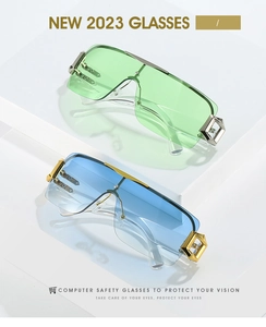 Detail of oversized rimless Y2K sunglasses with gradient lenses and metallic frames