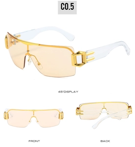 Y2K rimless sunglasses featuring orange lenses and gold hollow metal temple accents