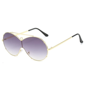 Oversized round sunglasses with gold metal frame and purple gradient lenses for women