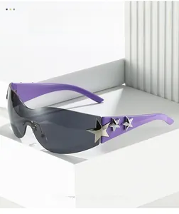 Detail of purple Y2K rimless sunglasses featuring silver metal star accents on temples