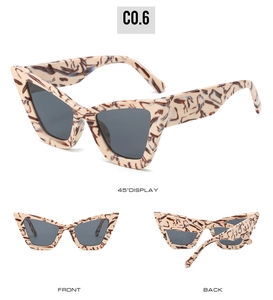 Front, back, and 45-degree angle views of marbled cat-eye sunglasses with dark lenses